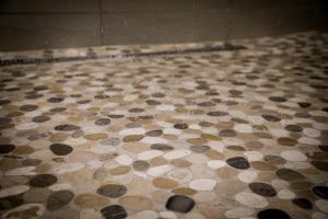 Rainwater Wellness Spa shower and mosaic tile floor